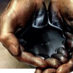 Нефть зависла около $91